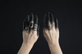 Cropped view of black painted hands Royalty Free Stock Photo