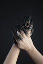 Cropped view of black painted hands Royalty Free Stock Photo