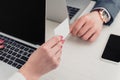 cropped view of businessman and businesswoman holding blank business card. Royalty Free Stock Photo