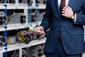 cropped view of businessman holding cash at ethereum Royalty Free Stock Photo