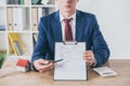 Cropped view of businessman holding clipboard Royalty Free Stock Photo