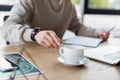 Cropped view of businessman taking coffee Royalty Free Stock Photo