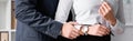 cropped view of businessman touching hand