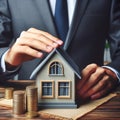 Cropped view of businessman touching roof of house model near stacked coins. Generated AI Royalty Free Stock Photo