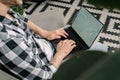 Young adult guy using modern laptop computer Royalty Free Stock Photo