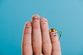 cropped view of cheerful fingers family isolated on blue.