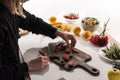 Cropped view of commercial female photographer making food composition for photo shoot Royalty Free Stock Photo