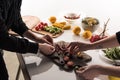 Cropped view of commercial photographers making food composition for photo shoot