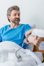 cropped view of doctor measuring blood pressure of patient in hospital. Royalty Free Stock Photo