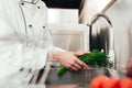 Cropped view of female cook Royalty Free Stock Photo