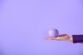 cropped view on female hand holding purple apple, Royalty Free Stock Photo