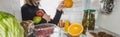 Cropped view of girl taking fresh fruits from refrigerator Royalty Free Stock Photo