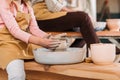 cropped view of kid making ceramic pot in workshop Royalty Free Stock Photo