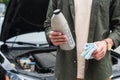 Cropped view of man holding bottle