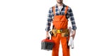 Cropped view of man in orange overall holding tool box and blueprint Royalty Free Stock Photo