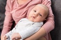 cropped view of mother holding her cute newborn son Royalty Free Stock Photo