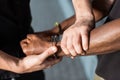 Cropped view of policeman touching hand Royalty Free Stock Photo