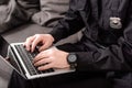 cropped view of policeman typing Royalty Free Stock Photo