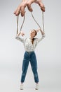 Cropped view of puppeteer holding marionette Royalty Free Stock Photo