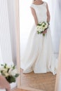 cropped view of reflection of bride in traditional dress with wedding bouquet Royalty Free Stock Photo