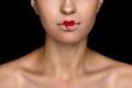 Cropped view of seductive fashionable woman with heart on lips