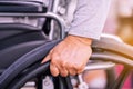 Cropped view of senior woman hands holding on wheelchair at home Royalty Free Stock Photo
