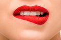 View of sexy young woman with red lipstick biting lips Royalty Free Stock Photo