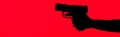 Cropped view of silhouette of criminal woman holding gun isolated on red Royalty Free Stock Photo