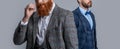 cropped view studio shot of gentlemen wearing tux. elegant gentlemen in formal tux suit