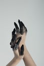 Cropped view of witch hands with Royalty Free Stock Photo