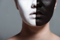 cropped view of woman with creative white and black bodyart on face, Royalty Free Stock Photo