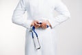 Cropped view of Woman Doctor in uniform standing and holding a stethoscope Royalty Free Stock Photo