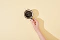 Cropped view of woman holding cup of fresh coffee Royalty Free Stock Photo