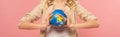 Cropped view of woman holding globe Royalty Free Stock Photo