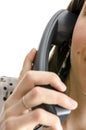 Woman holding a telephone handset Royalty Free Stock Photo