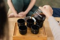 cropped view of woman pouring puer