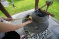 Cropped view woman washing hand in a temizuya Royalty Free Stock Photo