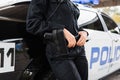 Cropped view of young policewoman leaning