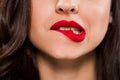 Cropped view of young woman biting Royalty Free Stock Photo