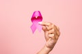 Cropped of woman holding pink ribbon Royalty Free Stock Photo
