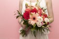 Cropped Woman Holds Beautiful Fresh Bouquet Of Flowers For Wedding Or Occasion On Pink Royalty Free Stock Photo