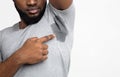 Young black man looking at the sweaty shirt Royalty Free Stock Photo