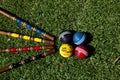 Croquet set and colorfull balls sit on the ground Royalty Free Stock Photo