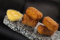 Croquettes with sauce
