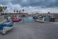 Cros-de-Cagnes, France 10.12.2020 Bay with colorful fishing boats. Panoramic view of marina in south of France. Calm water and Royalty Free Stock Photo