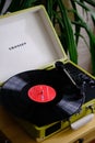 Crosley portable turntable playing long play record