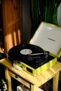 Crosley portable turntable playing long play record