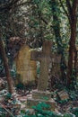 Cross amongst tombstones inside Hampstead Cemetery, London, UK