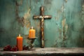 Cross and candle hanging on turquoise wood symbolizing peace and serenity, easter candles picture