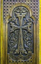 Cross carved on wooden door Royalty Free Stock Photo